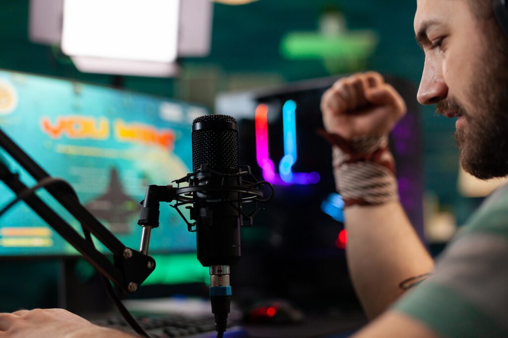 Close up of streamer winning shooter videogames